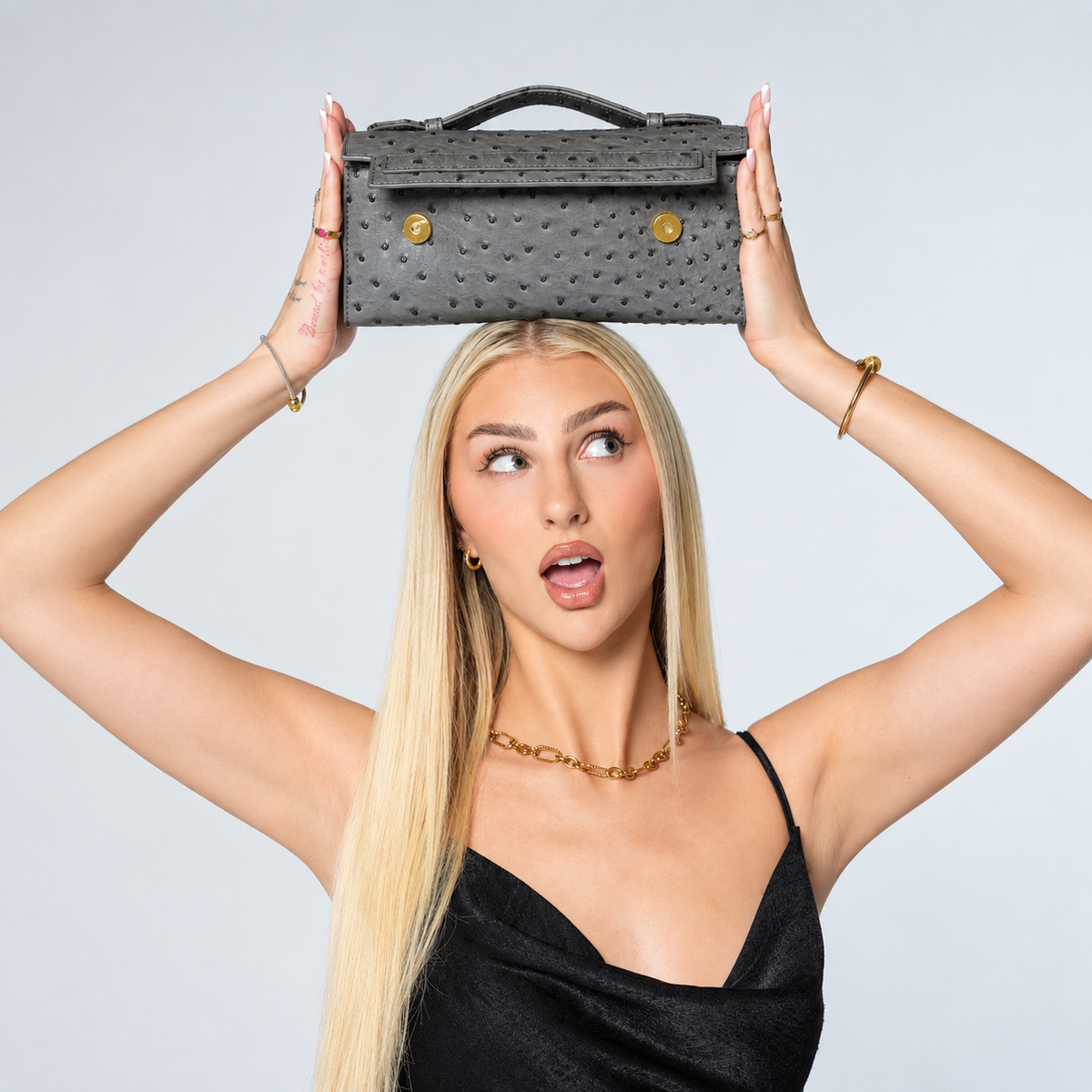 Pillar ostrich clutch